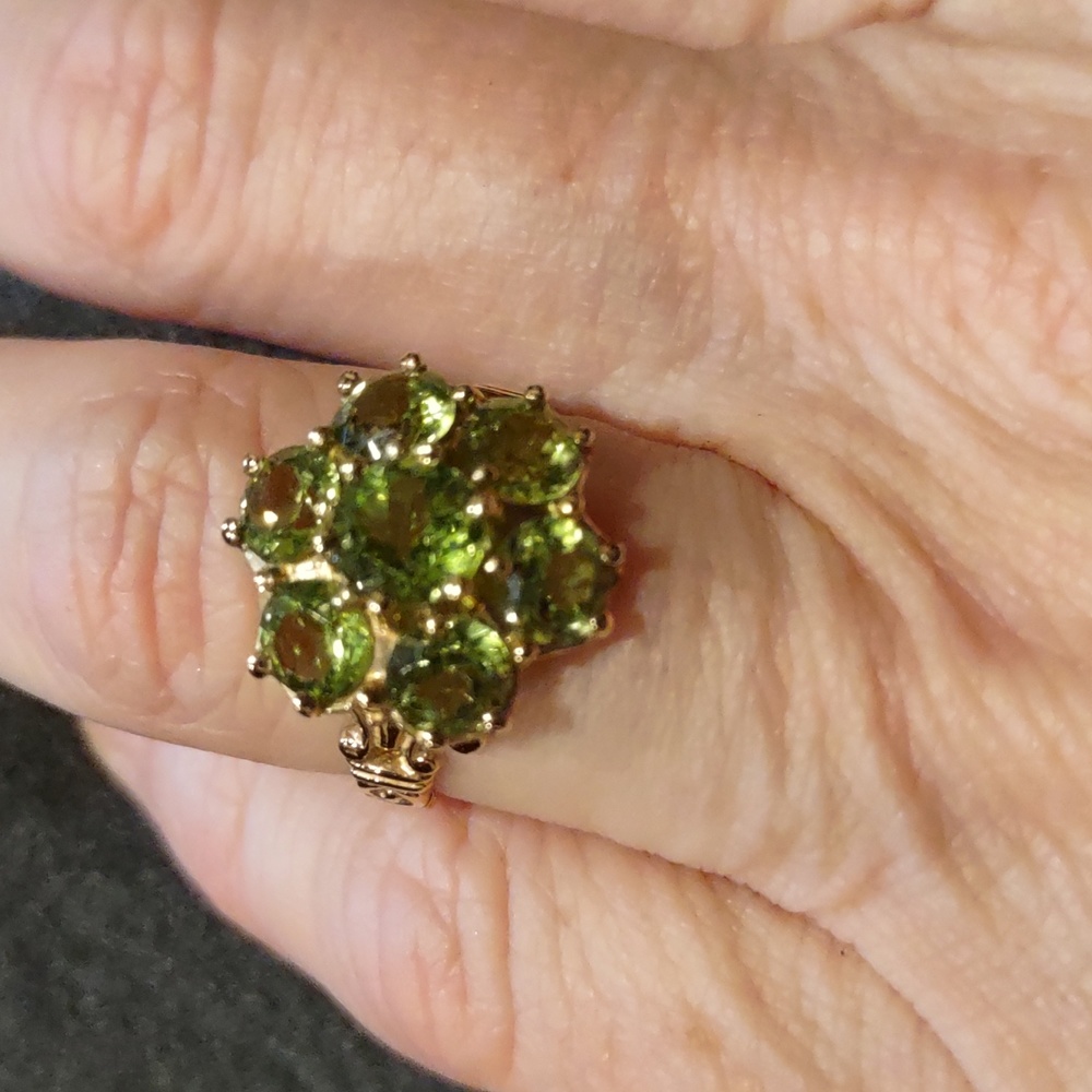 Peridot ring set in 10kt yellow gold